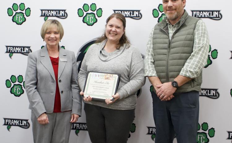 The Franklin County Board of Education honored Heather Elo (center) Tuesday for being named the Georgia Engineering and Technology Education Association’s (GETEA) 2023-24 Middle School Teacher of Excellence at the GETEA conference Feb 2-3.
